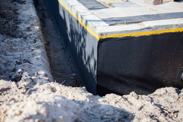 Professional Interior Drainage System technician working in Elwood, NJ